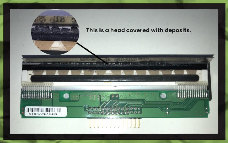 printer head covered with deposits