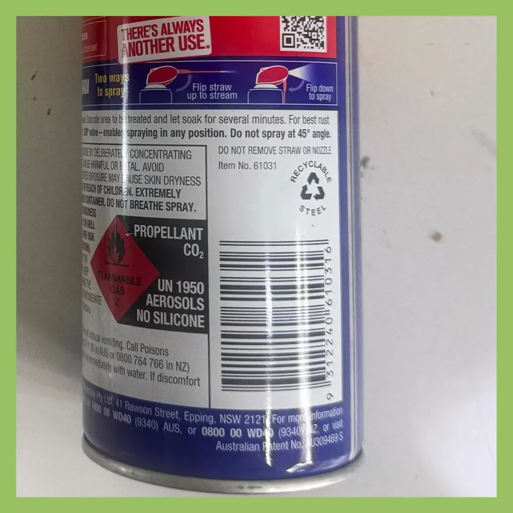 Horizontal barcode in ladder orientation on a spray can, demonstrating less ideal placement that may impact scan performance.