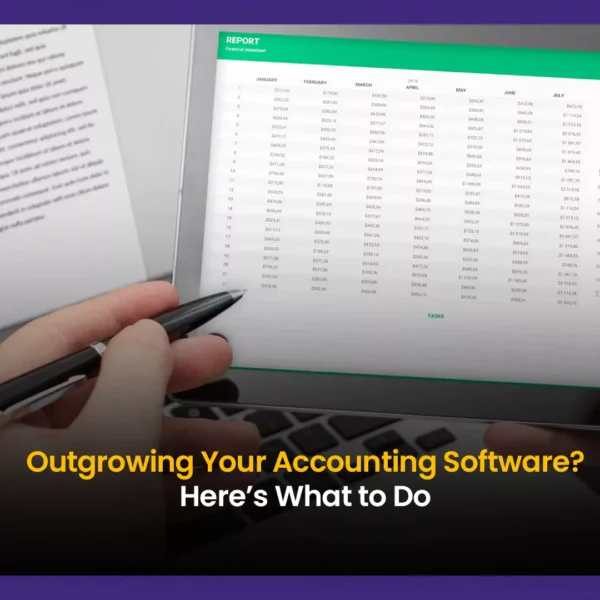 Hand pointing at spreadsheet with graphs on a laptop screen—representing outdated accounting software limitations in warehouse operations